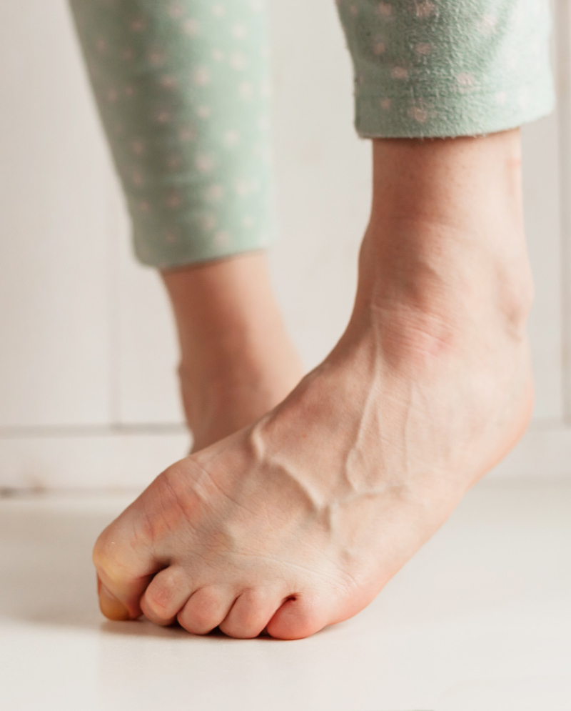 Woman pressing her toes against the floor